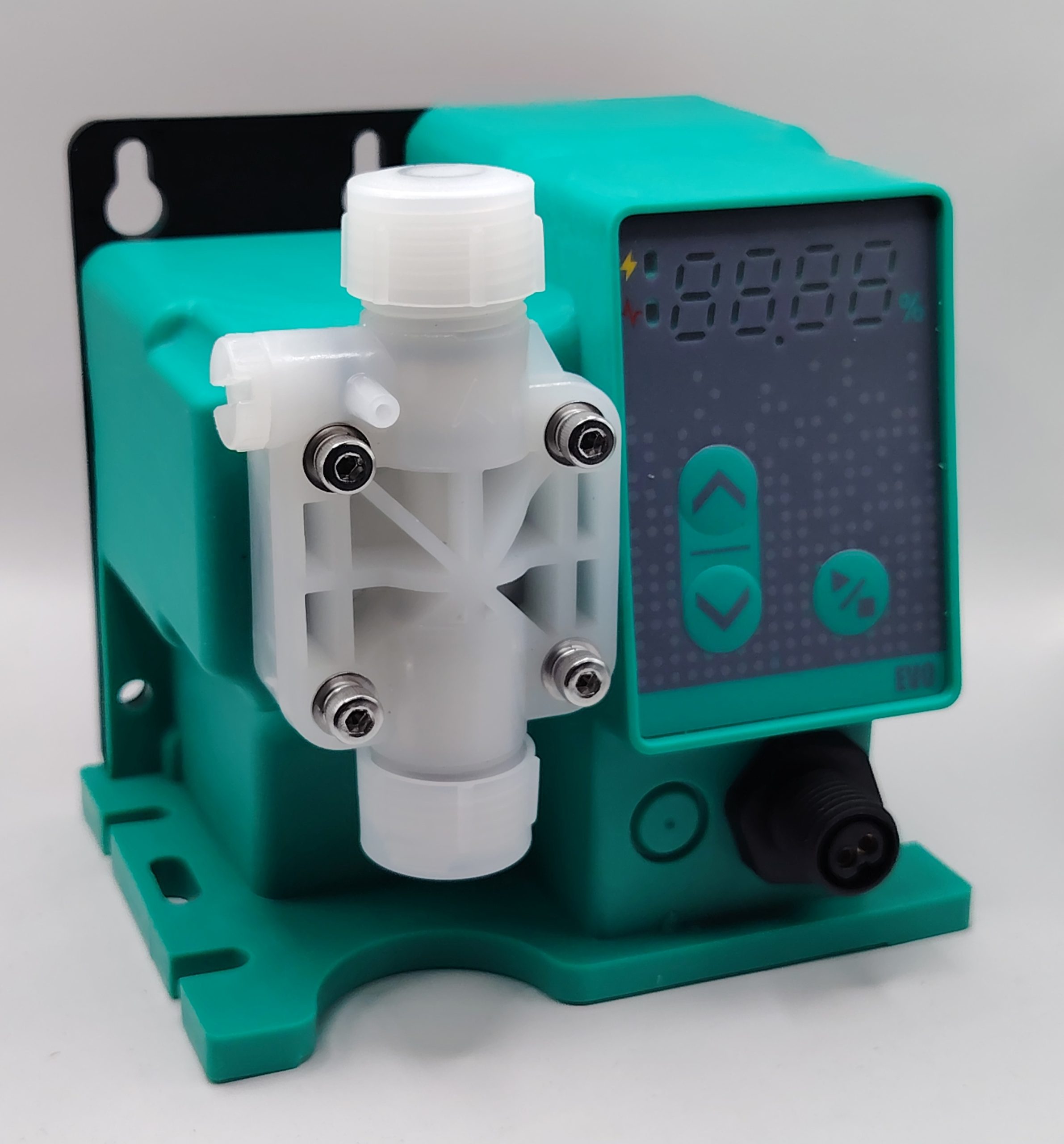 Doseco SM_Y - DOSECO Chemical Dosing Pumps Close-up of a white plastic valve connector bolted to a teal machine housing, with a digital display panel in the background.